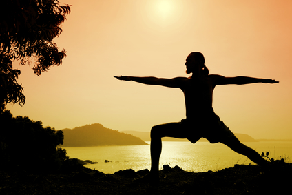 Man doing Exercise that shows his Flexibiliy